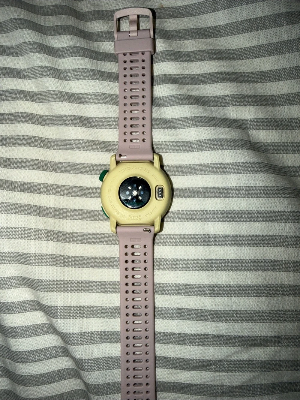 Coros sports watch with pink band